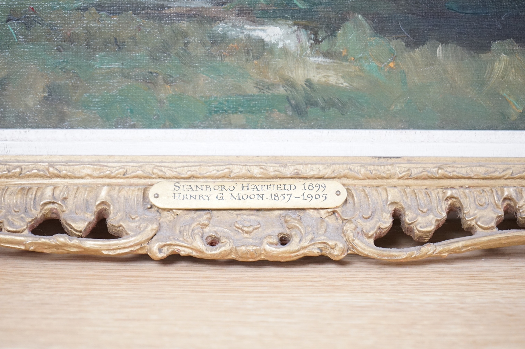 Henry G. Moon (1857-1905), oil on canvas, ‘Stanboro Hatfield, 1899’, signed in ink verso, 29 x 44cm, applied plaque to the ornate gilt frame. Condition - good
